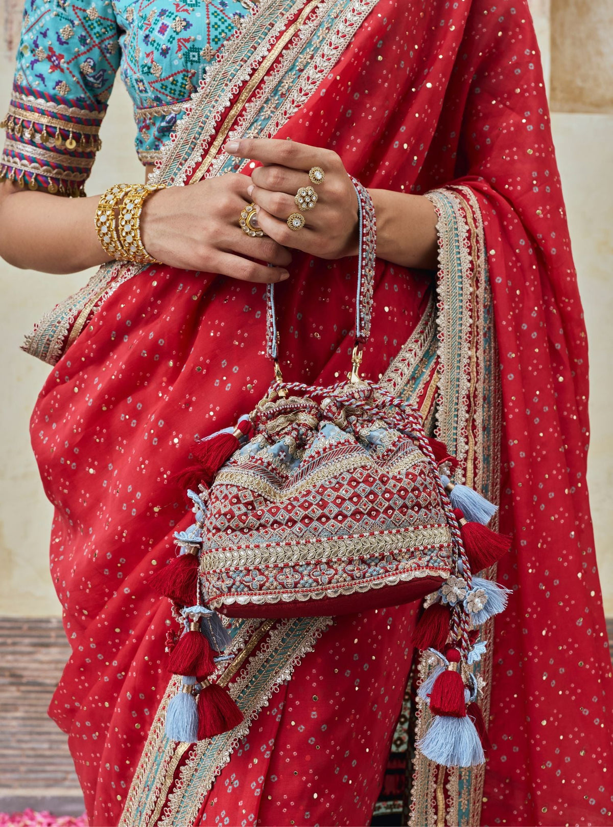 Shade of Sky Red & Blue Tassel Potli Bag