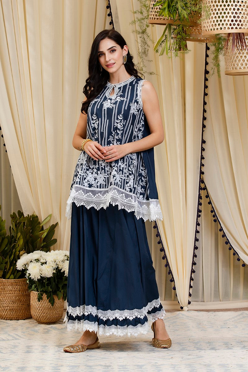 https://cdn.shopify.com/s/files/1/0088/4031/4931/files/MULMUL_BLOSSOM_NAVY_KURTI_WITH_BLOSSOM_SHARARA.mp4?v=1586773244